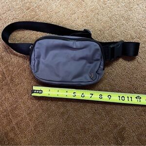 Lululemon black granite/dusky lavender belt bag